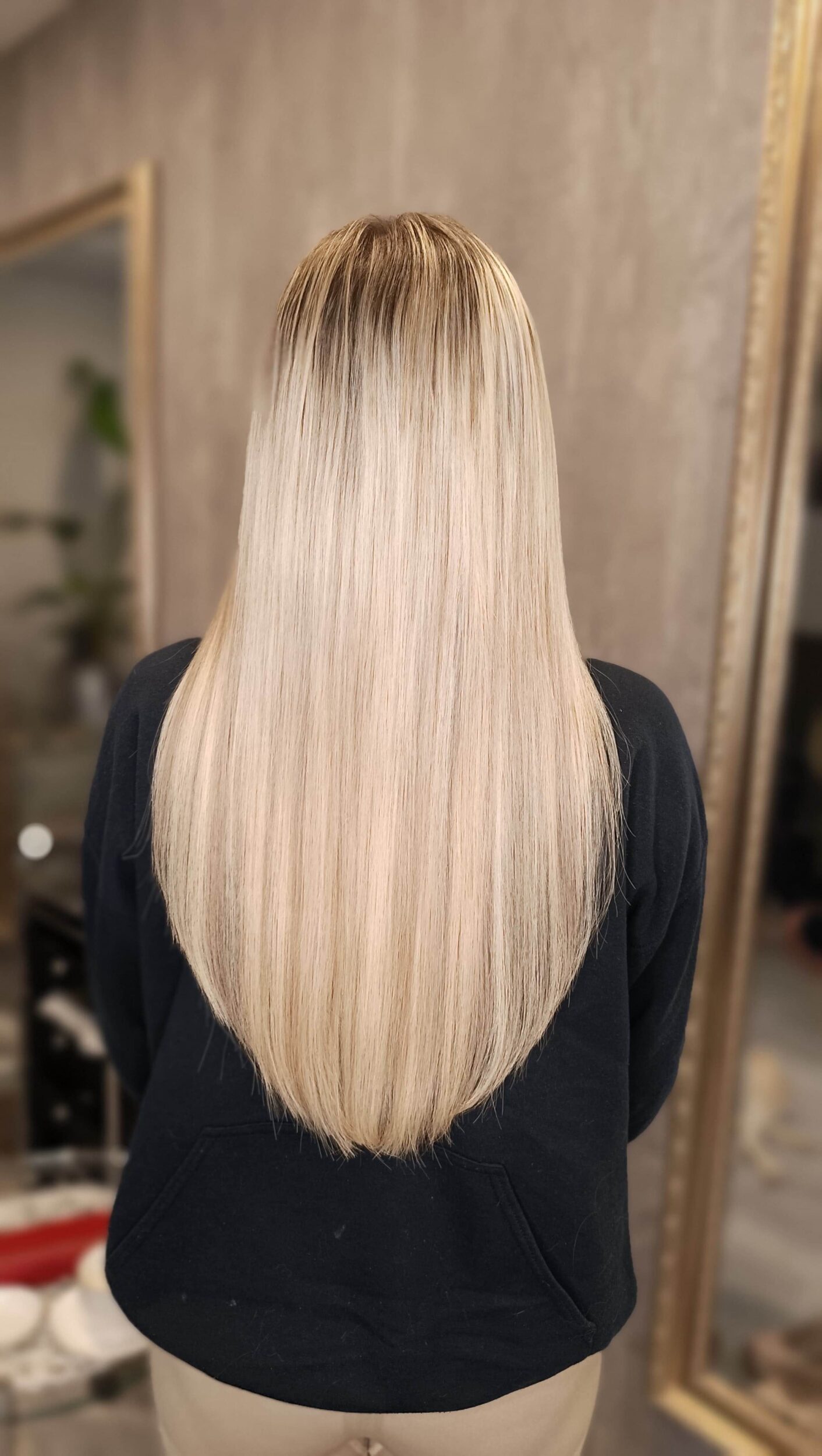 Blonde Strähnen mit extensions gewellt